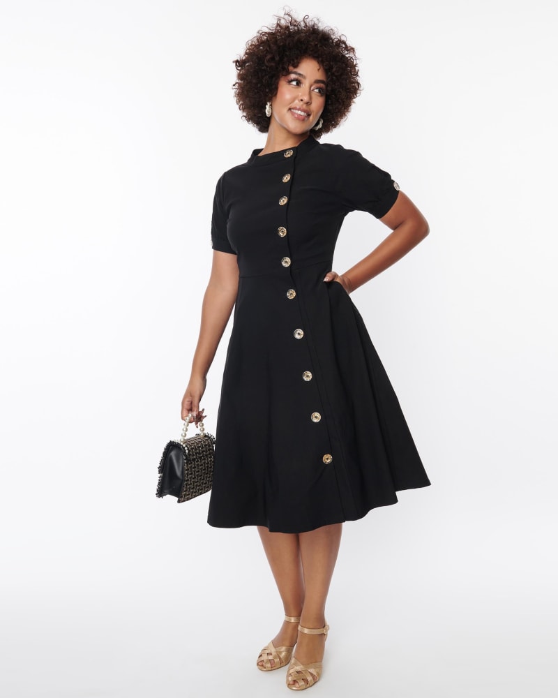 Front of a model wearing a size XL Unique Vintage Black Button Swing Dress in Black by Unique Vintage. | dia_product_style_image_id:287151